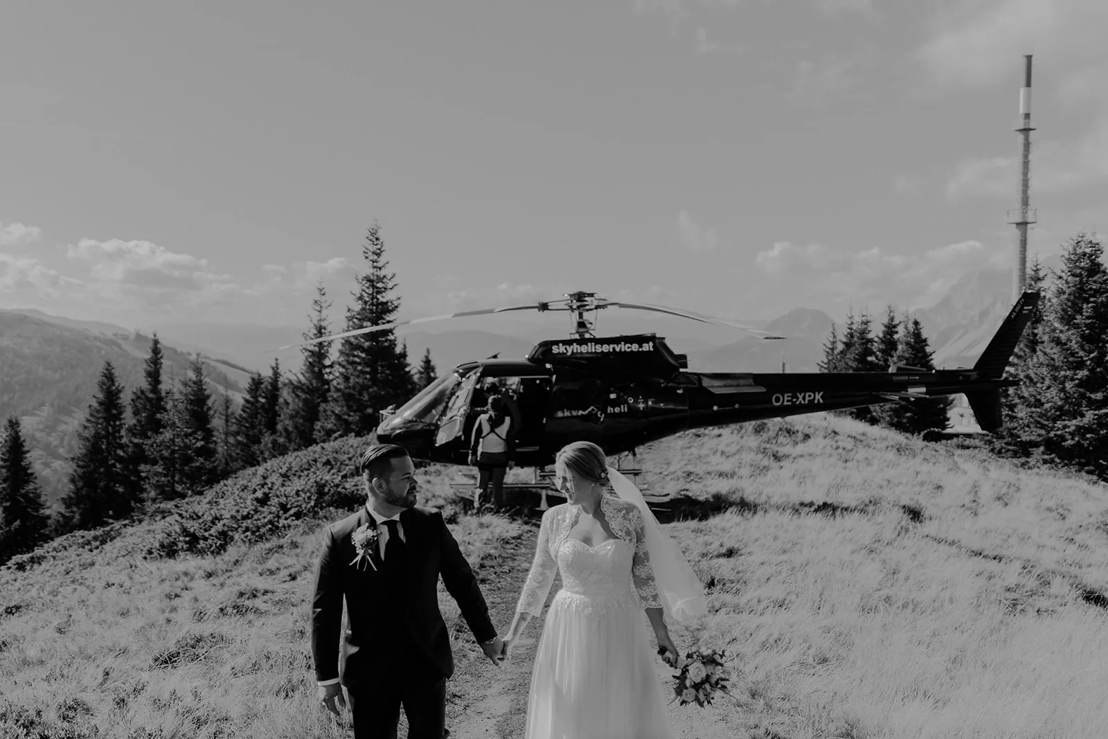 A couple eloping in the Alps amidst scenic mountain views and picturesque landscapes.