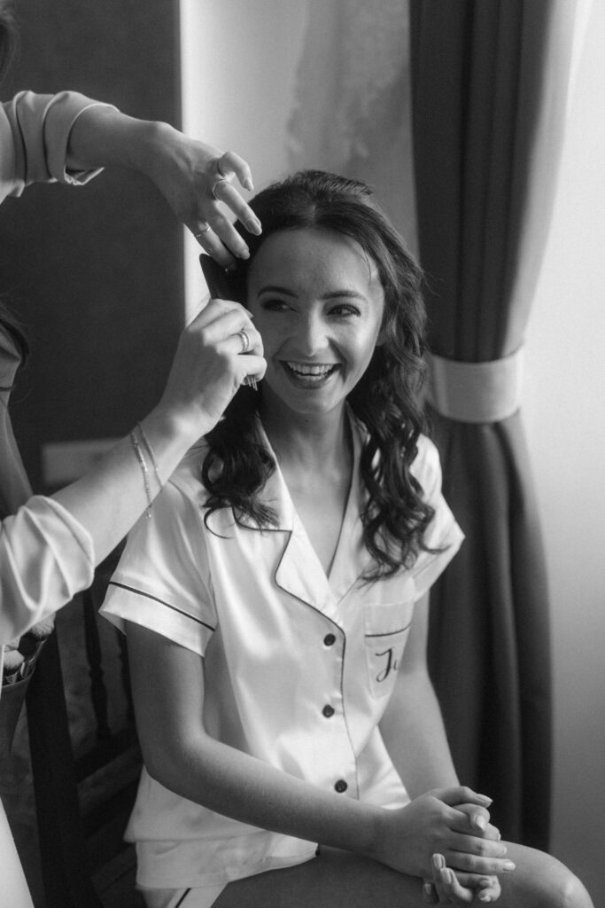 Candid bridal prep moment in Spain by destination wedding photographer