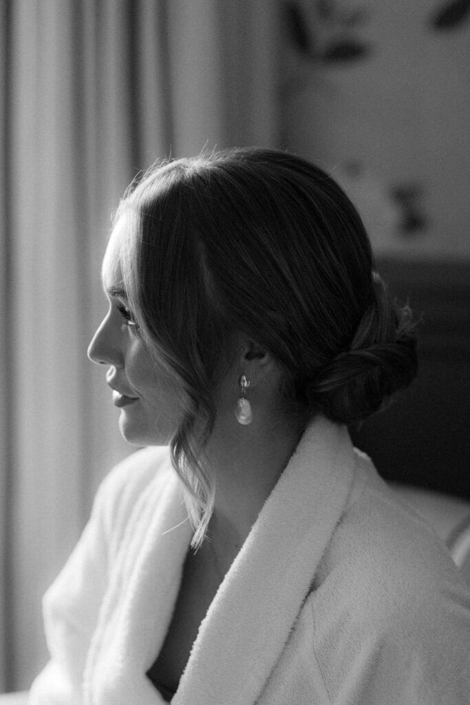 Timeless bridal profile shot in black and white – classic wedding photographer Spain look